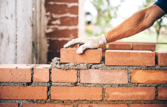 come costruire i muri in mattoni